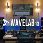 Music production studio setup with dual speakers; monitor shows WaveLab 13 editing software and waveform, with the WaveLab 13 logo prominently displayed.