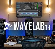 Music production studio setup with dual speakers; monitor shows WaveLab 13 editing software and waveform, with the WaveLab 13 logo prominently displayed.